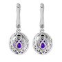 back view of purple sapphire and diamond double halo earrings in 18k white gold