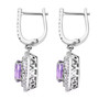 side view of purple sapphire and diamond double halo earrings in 18k white gold