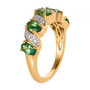 side view of tsavorite garnet and white zircon band ring in 18k yellow gold over sterling silver