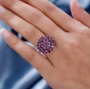 rhodolite garnet and white zircon cluster ring in rhodium over sterling silver worn on a hand