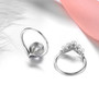 close up of natural gemstone and pearl two ring set in rhodium over sterling silver
