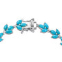 clasp detail of turquoise and moissanite bracelet in rhodium over sterling silver