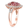 side view of pink spinel and moissanite double halo ring in 18k rose gold over sterling silver