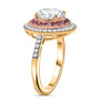 side view of moissanite and pink sapphire halo ring in 18k yellow gold over sterling silver