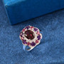 rhodolite garnet amethyst and zircon ring in rhodium over sterling silver shown in a lifestyle photo