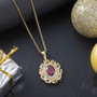 rhodolite garnet citrine and zircon halo pendant necklace in 18k yellow gold over sterling silver shown in a lifestyle photo