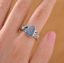 boulder opal triplet and multi gemstone ring in rhodium over sterling silver worn on a hand