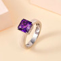 asscher cut amethyst solitaire ring in rhodium over sterling silver shown in a lifestyle photo