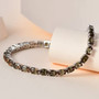 andalusite tennis bracelet in rhodium over sterling silver shown in a lifestyle photo