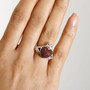 garnet heart cluster claddagh ring in rhodium over sterling silver worn on a hand