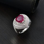 heart ruby (ff) and white zircon halo ring in rhodium over sterling silver shown in a lifestyle photo