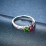side view of chrome diopside and rhodolite garnet two-stone ring in rhodium over sterling silver