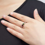 chrome diopside and rhodolite garnet two-stone ring in rhodium over sterling silver worn on a hand