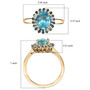blue apatite and blue and white diamond halo ring in 10k yellow gold shown for size comparison