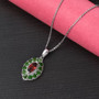garnet and chrome diopside pendant necklace in rhodium over sterling silver shown in a lifestyle photo