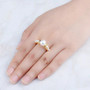 freshwater pearl ring in 18k yellow gold over sterling silver worn on a hand