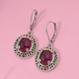 ruby (ff) and chrome diopside earrings in 18k yellow gold and rhodium over sterling silver shown in a lifestyle photo