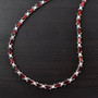 garnet and white zircon adjustable necklace in rhodium over sterling silver shown in a lifestyle photo