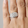 lab diamond cluster ring in rhodium over sterling silver worn on a hand