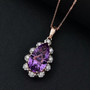 pear amethyst and white zircon pendant necklace in 18k rose gold over sterling silver shown in a lifestyle photo