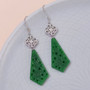 green jade fishhook earrings in rhodium over sterling silver shown in a lifestyle photo