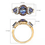 unheated tanzanite brown and white zircon trilogy halo ring in 18k yellow gold over sterling silver shown for size comparison