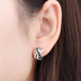 black spinel earrings in rhodium over sterling silver worn on the ear