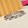 moissanite tennis bracelet in rhodium over sterling silver shown in a lifestyle photo