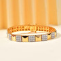 moissanite tennis bracelet in 18k yellow gold over sterling silver shown in a lifestyle photo