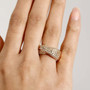 champagne diamond crossover band ring in 18k rose gold over sterling silver worn on a hand