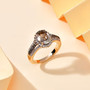 turkizite champagne and white diamond oval halo ring in solid 14k yellow gold shown in a lifestyle photo