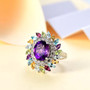 amethyst multi gemstone halo ring in rhodium over sterling silver shown in a lifestyle photo