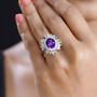 amethyst multi gemstone halo ring in rhodium over sterling silver worn on a hand