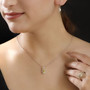 heliodor and yellow sapphire jewelry set in 18k yellow gold and rhodium over sterling silver shown being worn