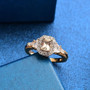 turkizite and white zircon radiant halo ring in 18k yellow gold over sterling shown in a lifestyle photo