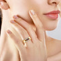 gents sapphire and moissanite ring in 18k yellow gold over sterling silver worn on a hand