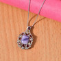 tiffany stone and garnet two-tone 18k yellow and rhodium over sterling silver pendant necklace shown in a lifestyle photo