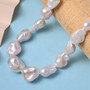 baroque pearl necklace in 14k yellow gold with magnetic clasp 20" shown in a lifestyle photo