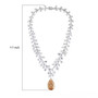 champagne and white moissanite statement necklace in rhodium over sterling silver scale