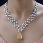 champagne and white moissanite statement necklace in rhodium over sterling silver on neck model