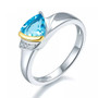 swiss blue topaz and white zircon accents ring in 18k yellow gold and rhodium over sterling silver