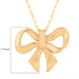 10k yellow gold bow necklace shown for size comparison