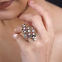 multi color tourmaline and moissanite cluster ring in rhodium over sterling silver worn on a hand