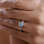 aquamarine rubellite and diamond ring in solid 10k white gold worn on a hand