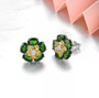 close up of chrome diopside citrine and white zircon cluster earrings in rhodium over sterling silver