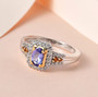 tanzanite brown and white zircon halo ring in 18k yellow gold and rhodium over sterling silver shown in a lifestyle photo