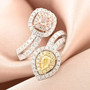 pink yellow and white diamond bypass ring in 14k white gold shown in a lifestyle photo