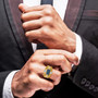 blue yellow and white diamond gents ring in 18k yellow gold over sterling silver worn on a hand