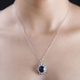 black jade rainbow moonstone and garnet pendant necklace in rhodium over sterling silver worn around the neck
