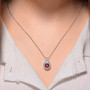 red and white moissanite interchangeable halo pendant necklace in rhodium over sterling silver worn around the neck
